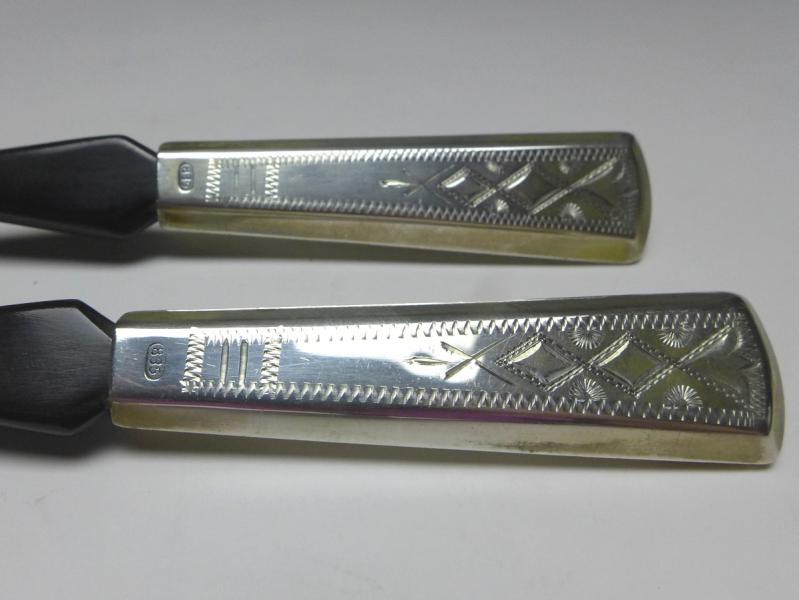 Salatbesteck 2-teilig, Laffen aus Horn, Griffe 835er Silber, L: 16,5 cm